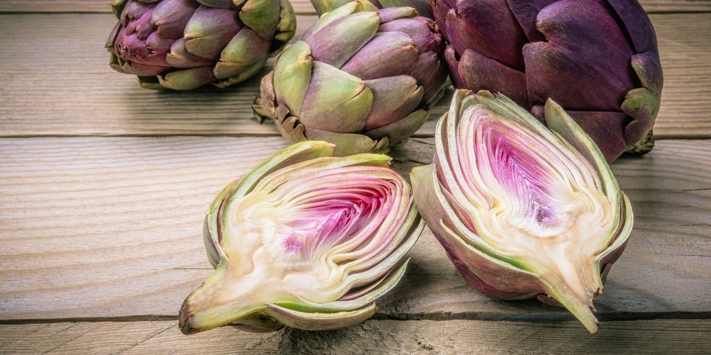 artichokes on a wooden table